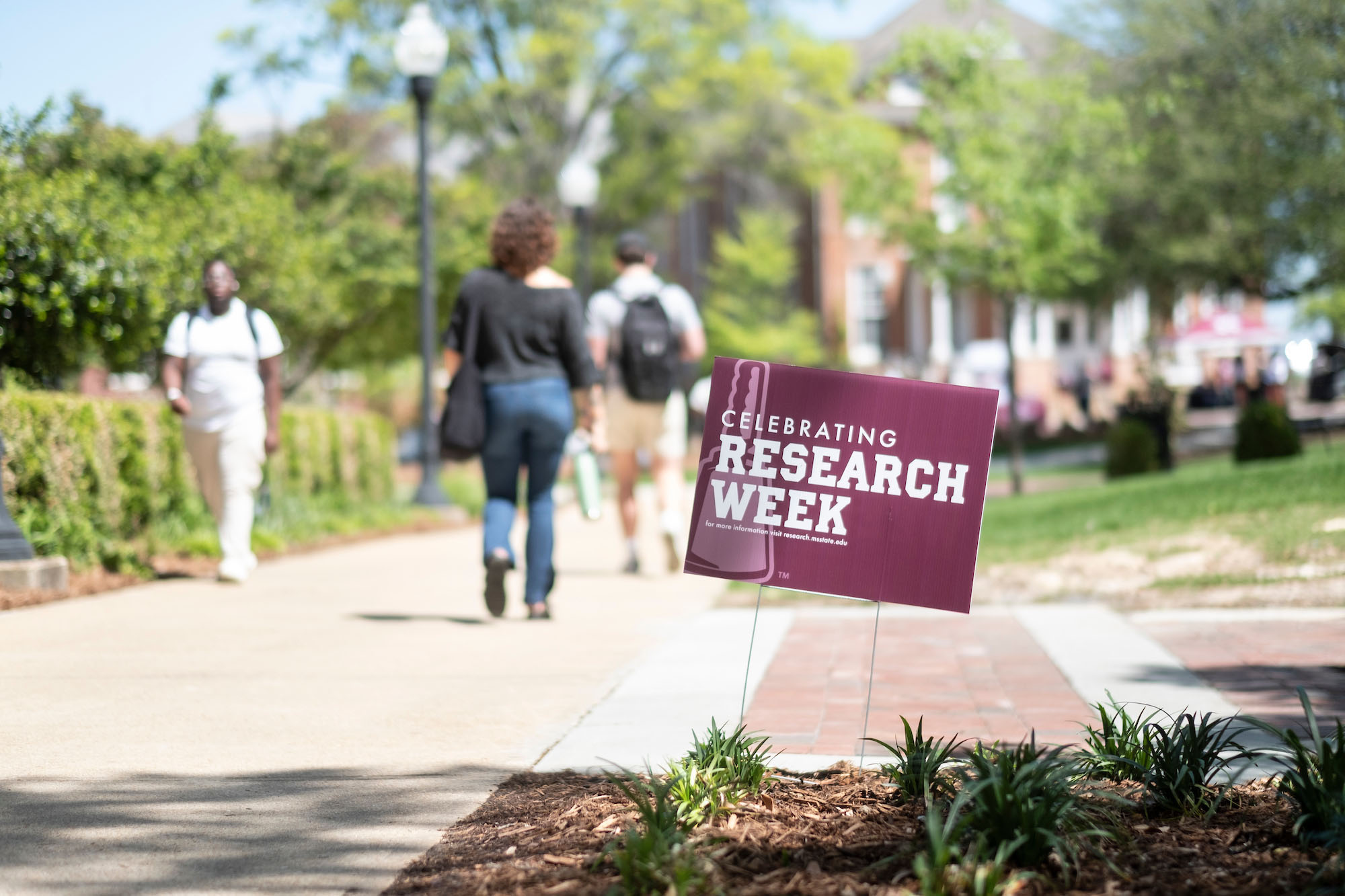 A sign adjacent to the Colvard Student Union advertises Research Week