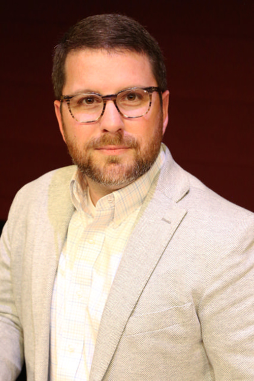 A studio portrait of Phillip Stockton