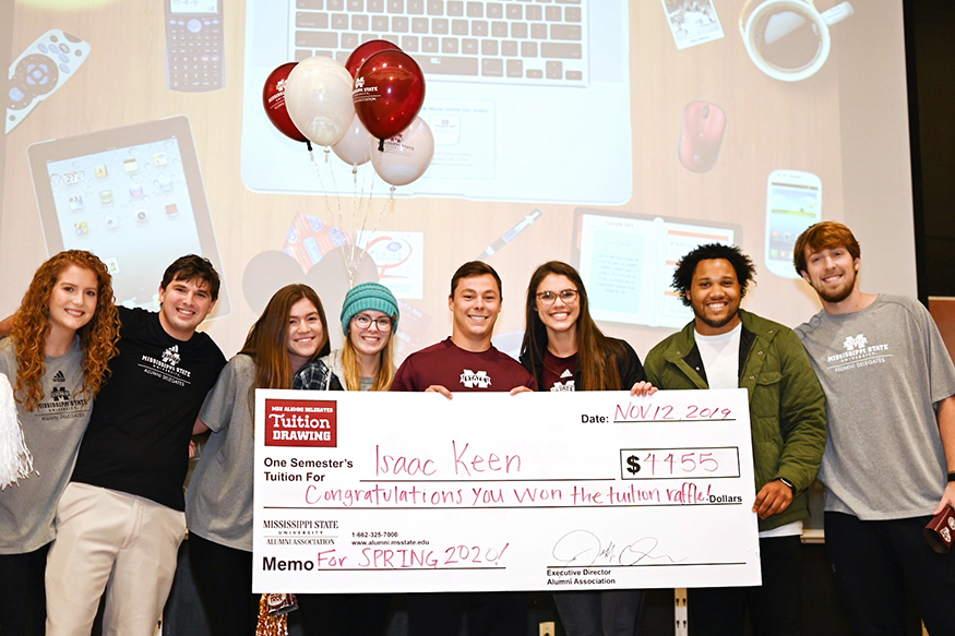 MSU Alumni Association tuition drawing check presentation