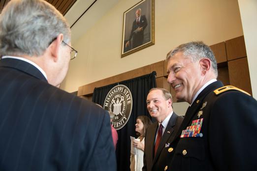 MSU President Mark E. Keenum and Maj. Gen. Janson D. “Durr” Boyles visit with others in attendance during Friday’s dedication ceremony for the G.V. “Sonny” Montgomery Lobby at Nusz Hall. The newly constructed building also is home to the G.V. “Sonny” Montgomery Center for America’s Veterans. (Photo by Beth Wynn)
