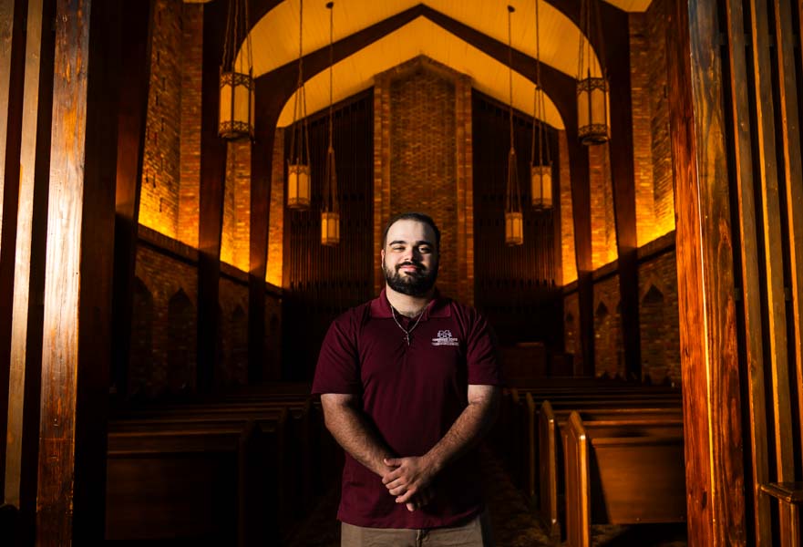 Anthony Mattina in a chapel