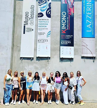 MSU fashion design and merchandising majors on a study abroad trip pictured outside the Museo del Tessuto, or Textile Museum in Prato, Italy, in June.