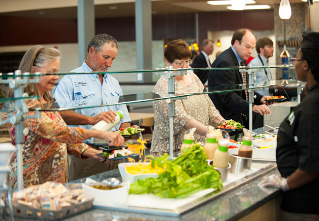 Patrons make lunch selections at MSU’s newest residential dining facility, The Fresh Food Company.