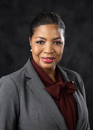 Portrait photo of Linda Coats.