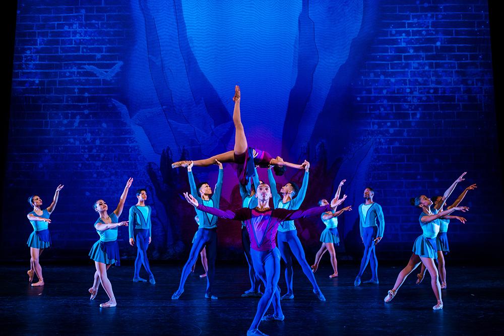 Multiple performers with the Collage Dance Collective are shown striking dance poses on stage.