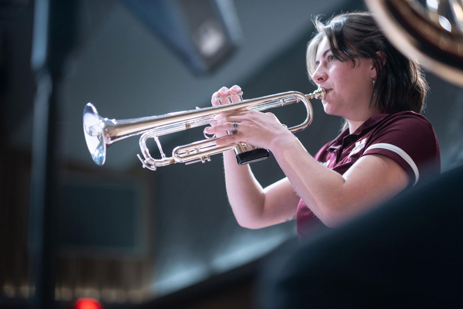 An MSU student plays a trumpet