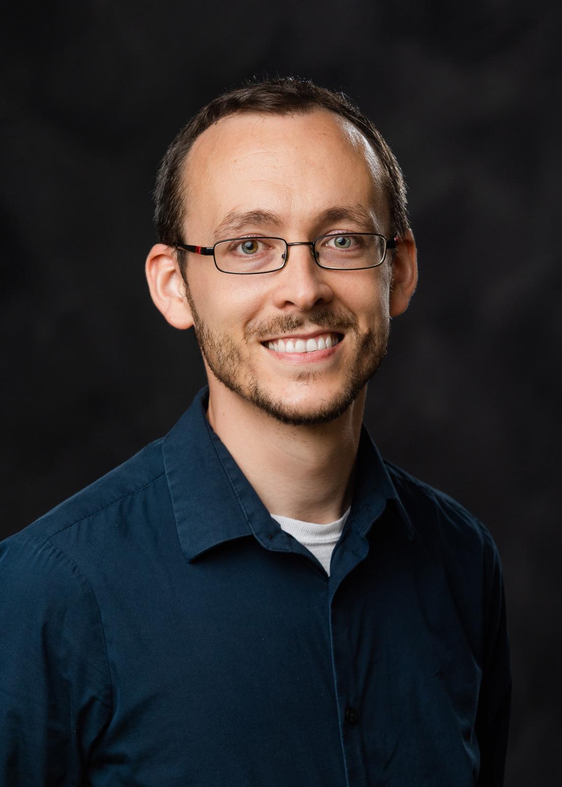 Ryan Folk headshot