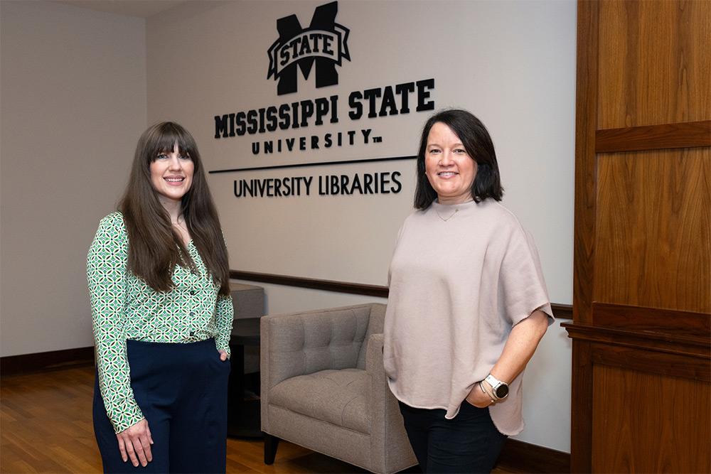 Curator of Material Culture Carrie P. Mastley, left, and University Archivist Jessica Perkins Smith