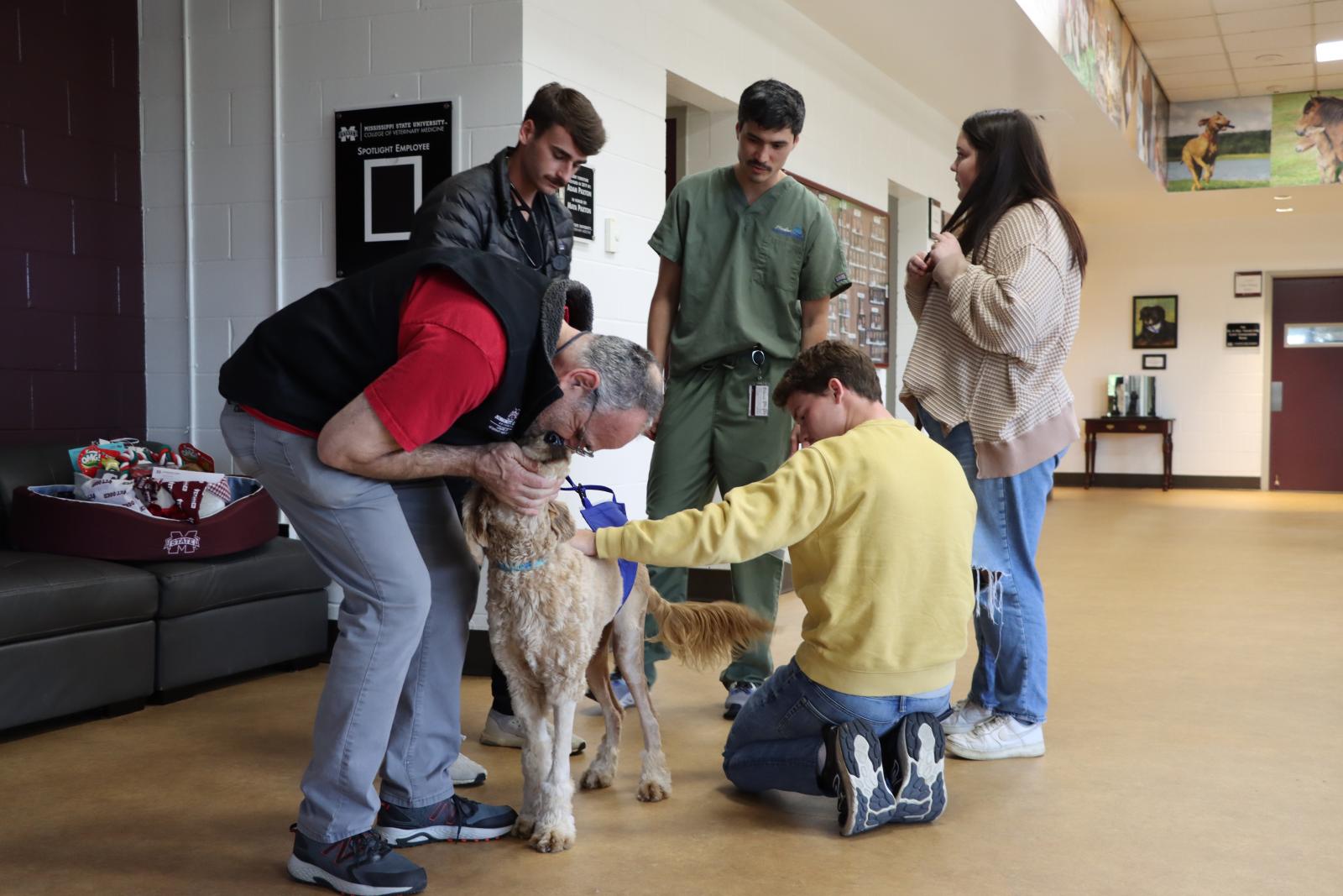 Dr. Michael Jaffe kisses his patient Maple good bye after nearly a month of taking care of her