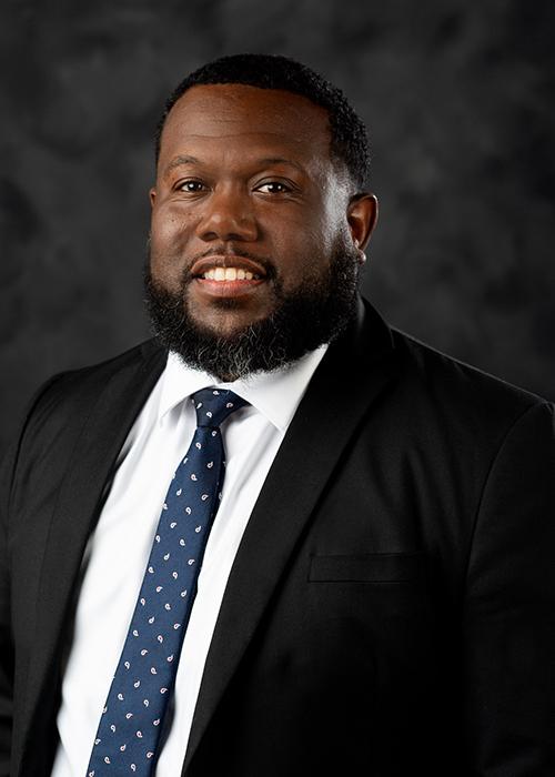 A portrait of Tommy "T.J." Walker.