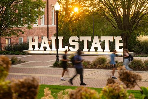 MSU students walk through Hail State Plaza.