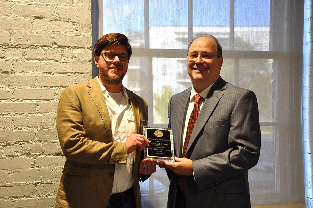Michael S. Pratte, associate professor of psychology, with College of Arts and Sciences Dean Rick Travis