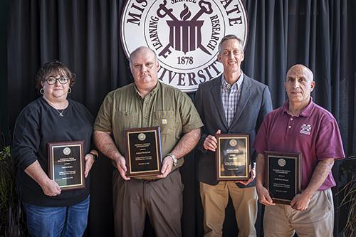 Mississippi State College of Forest Resources professorship and fellowship honorees pose with their awards.