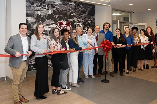 Faculty, staff and students celebrate the opening of the Mississippi State Psychology Clinic’s new location in Rice Hall in August.