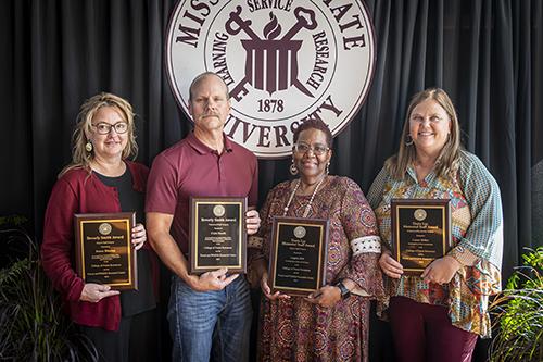 Mississippi State College of Forest Resources staff pose with their awards.