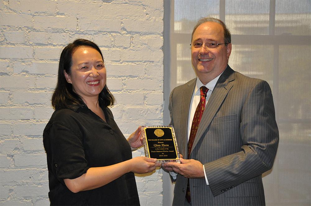 Qian Michelle Zhou, associate professor of mathematics and statistics, with College of Arts and Sciences Dean Rick Travis