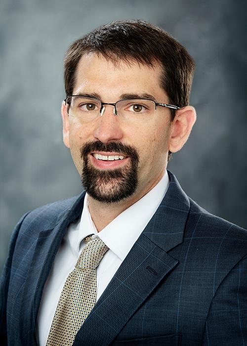 A portrait of Benjamin Tkach.