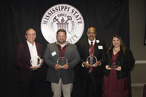 Mississippi State alumni recognized with the 2025 Distinguished Service Award include, from left, William Thomas, Heath Barnett and Col. Robert Barnes Jr. Jessica Dougan, right, received the Outstanding Young Alumna Award.
