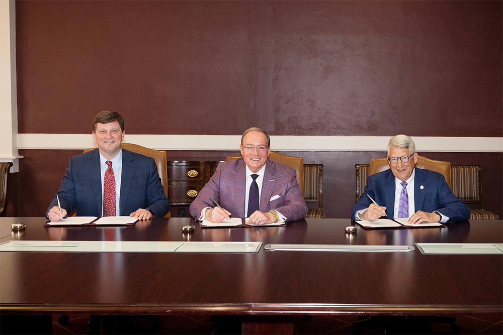 MSU Vice President for Development and Alumni John Rush, left, MSU President Mark E. Keenum, and USGA President Jim Bultema