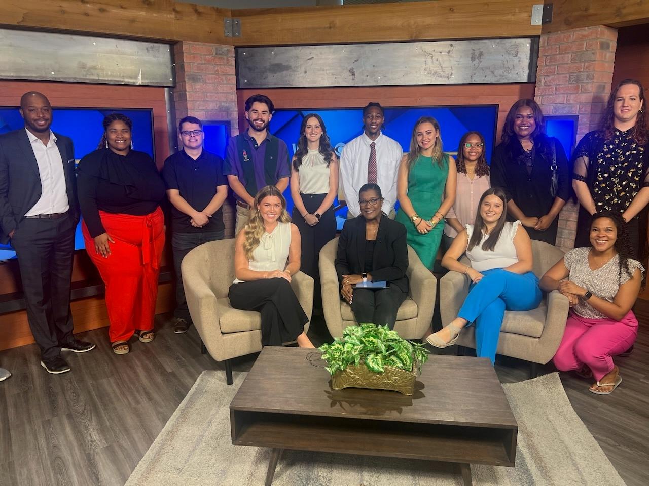 Student members of “Take 30 News” visit former WCBI anchor Aundrea Self, seated in middle, who has since joined MSU’s College of Business as director of outreach and engagement. (Photo submitted)