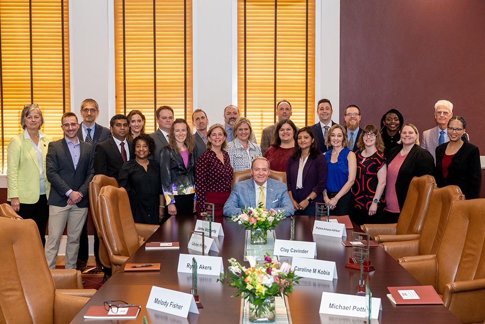 MSU President Mark E. Keenum poses with participants of the MSU Faculty Leadership Program.