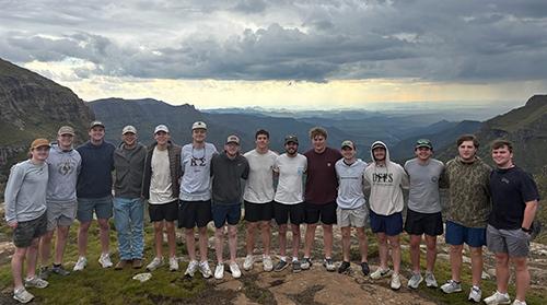Members of Mississippi State’s Kappa Sigma Fraternity pose while on a volunteer trip in Lesotho, Africa.