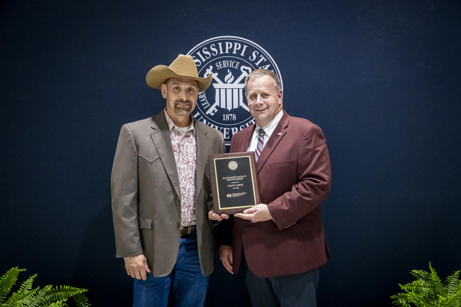 From left, Rocky Lemus, CALS/MAFES Outstanding Faculty Service Award, and Scott Willard, CALS dean and MAFES director. (Photo by David Ammon)