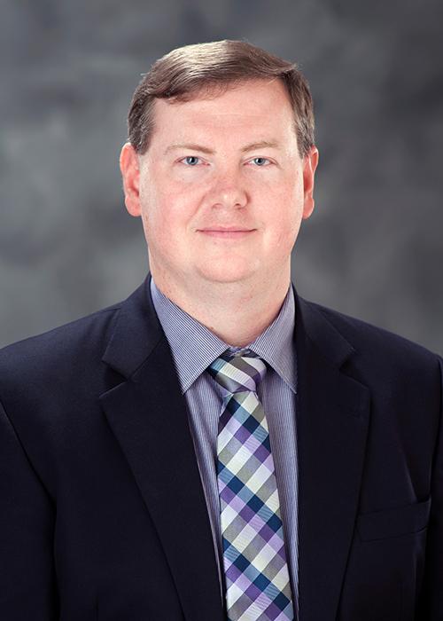 A portrait of Daniel Carruth.