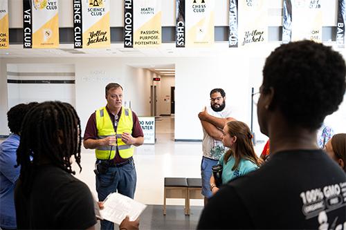 Andrew Rendon, MSU executive director for veteran and military affairs, briefs participants in the emergency preparedness exercise at Partnership Middle School on June 6.