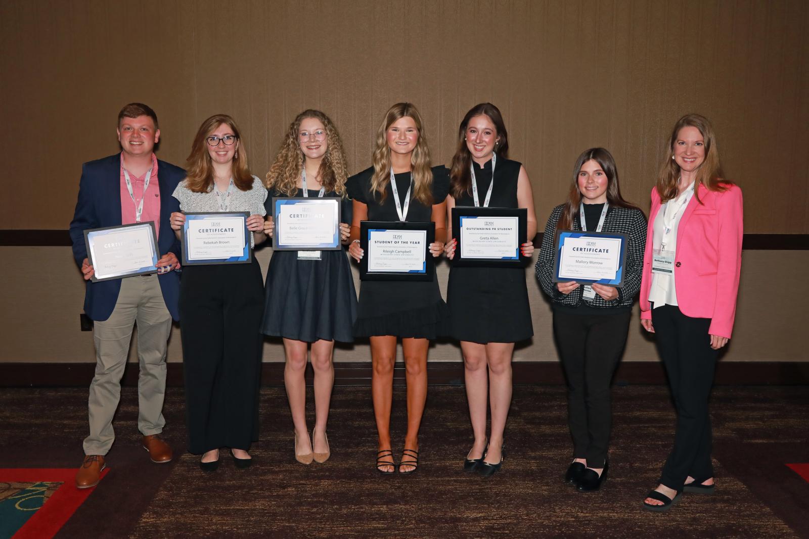 Six MSU communication students recently were recognized during the Public Relations Association of Mississippi’s Student of the Year program. Pictured from left, Isaac Sivils; Rebekah Brown; Belle Grace Wilkinson; Rileigh Campbell, PRAM Student of the Year; Greta Allen, PRAM Outstanding PR Student; Mallory Morrow; and Bethany Shipp, PRAM vice president of student services and MSU communications specialist. (Submitted Photo)