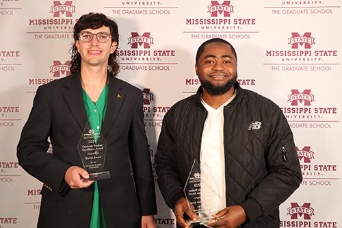From left: Kevin Jones and Ridwan Ayinla pose with awards.