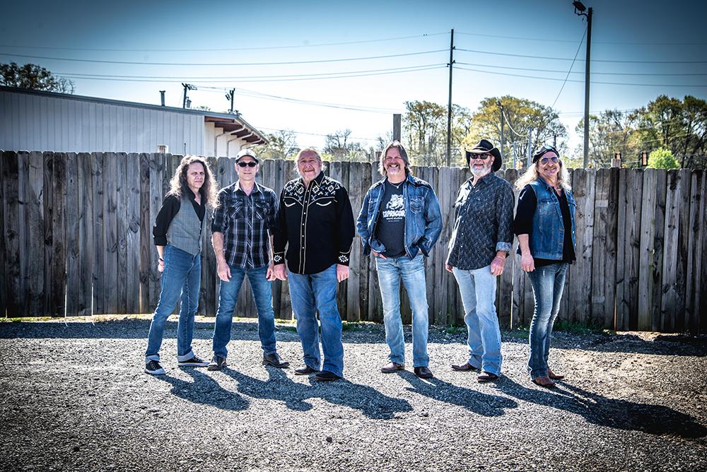 Members of the Marshall Tucker Band pose in a promotional photo.