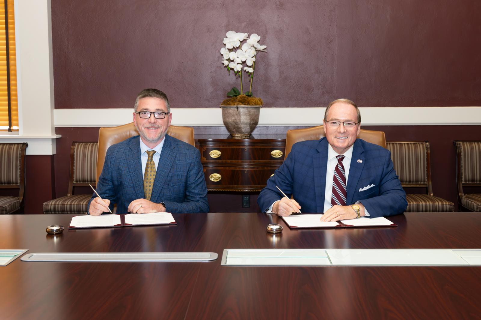 ECCC President Brent Gregory, left, and MSU President Mark E. Keenum signed a memorandum of understanding Aug. 18 to provide a smooth transfer pathway for culinary arts students at the community college to pursue a bachelor’s degree in culinology at the university.