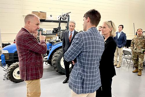 MSU's Alex Thomasson leads a tour of the Agriculture Autonomy Institute, talking with state Rep. Jill Ford and other members of the AI Legislative Task Force.