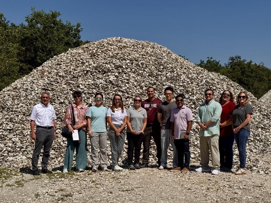 The research team that is a finalist for a $20 million award as part of the Gulf Futures Program includes, from left,  David Perkes; Mississippi State University; Katerina Sergi, MSU; Boran Ma, University of Southern Mississippi; Narcia Pricope, MSU; Gina Rico-Mendez, MSU; Paul Mickle, MSU; Zhe Qiang, USM; Arun Venugopalan, MSU; Ryan Bradley, Mississippi Commercial Fisheries United; Cristina Childers, MSU; and Denise Navicky, MSU.