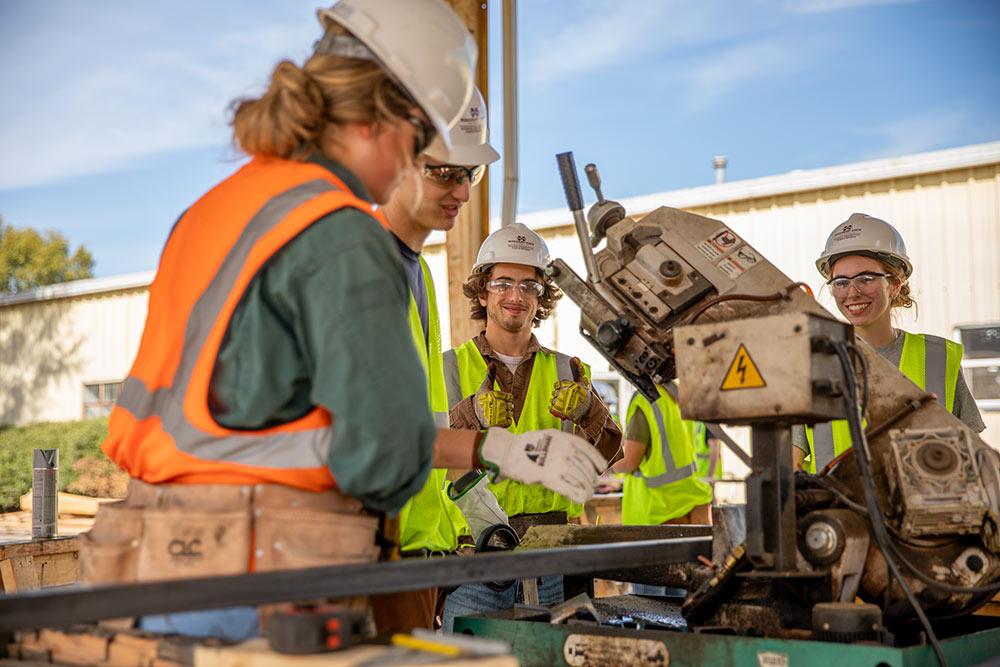 Construction workers are pictured at a job site.