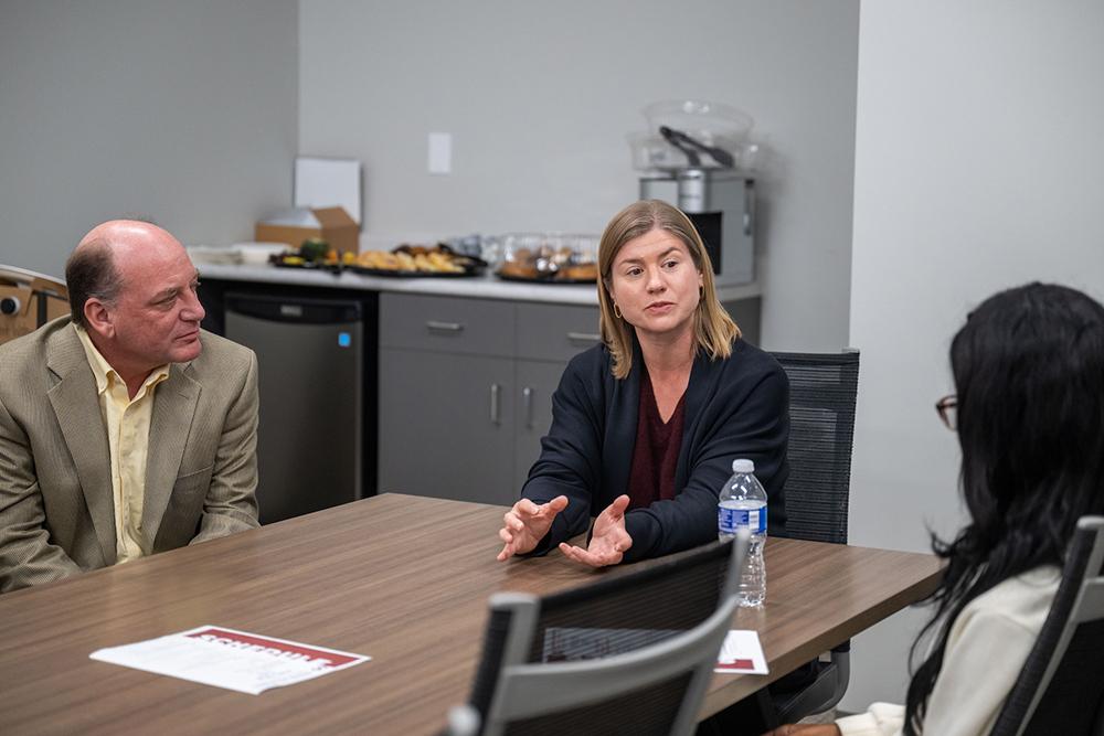 Mississippi State Associate Professors Holly Seitz, center, and John Nicholson, left, speak to a prospective student during the Department of Communication, Media and Theatre’s Communication Graduate Preview Day in April.