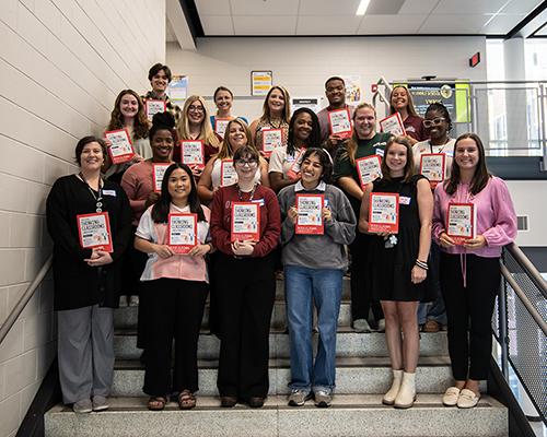 Mississippi State Associate Professor Liza Bondurant, top right, is pictured with MSU secondary education students and math teachers and administrators from Starkville Oktibbeha Consolidated School District’s Partnership Middle School.