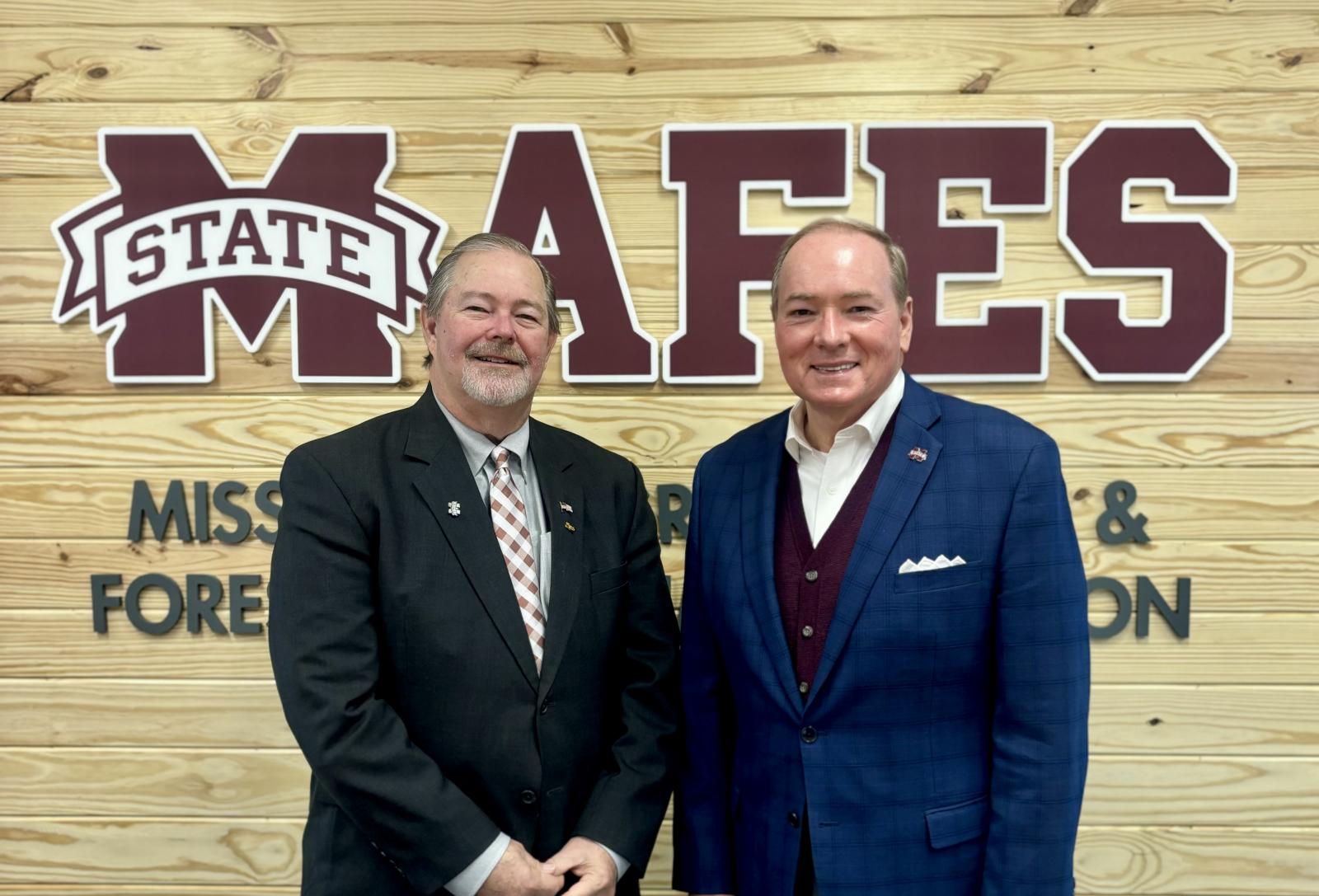 USDA Deputy Under Secretary for Research, Education, and Economics Scott Hutchins, left, with MSU President Mark E. Keenum