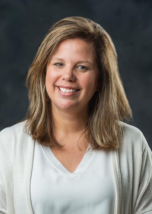 A portrait of Michelle Stubbs.