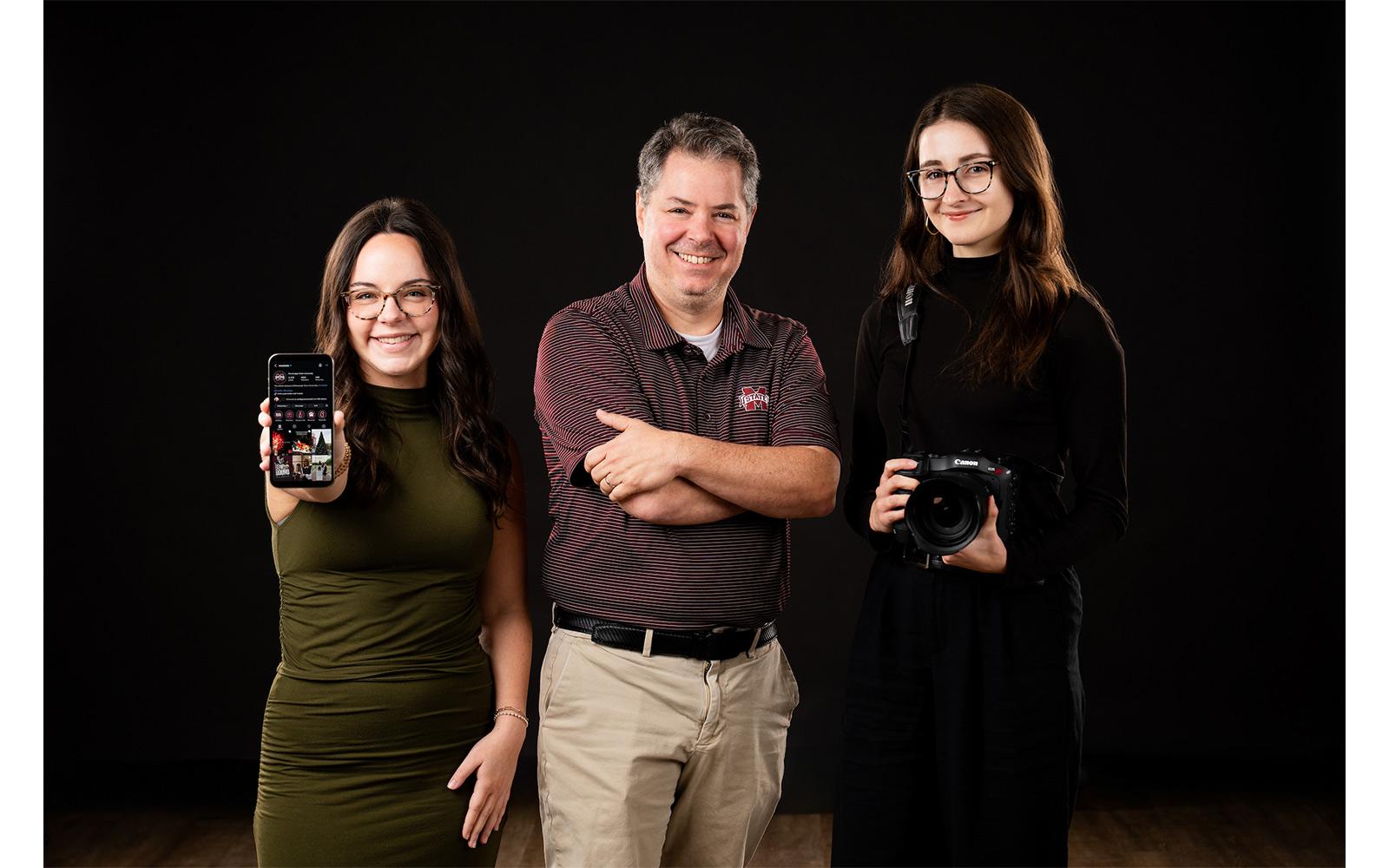 Mississippi State social media continues to climb the ranks with recent strategic efforts in the university’s Division of Strategic Communications and its Office of Public Affairs. Standing from left are Sarah Triplett, social media strategist; Thomas Broadus, chief marketing officer; and Sarah Kirk, video producer.