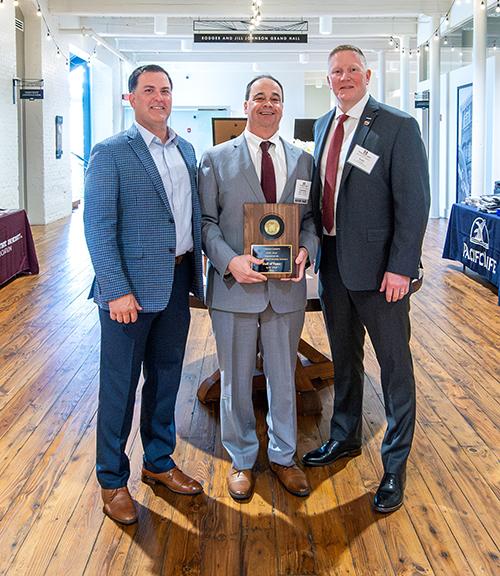Pictured from left are MSU Director of Risk Management and Insurance Seth Pounds, EMC Insurance Companies Regional Vice President Coleman Cummins and MSU College of Business Dean Scott Grawe.