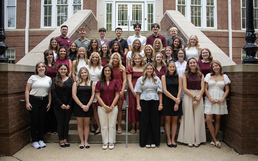Mississippi State's 14th Mississippi Excellence in Teaching Program cohort poses in front of a building.