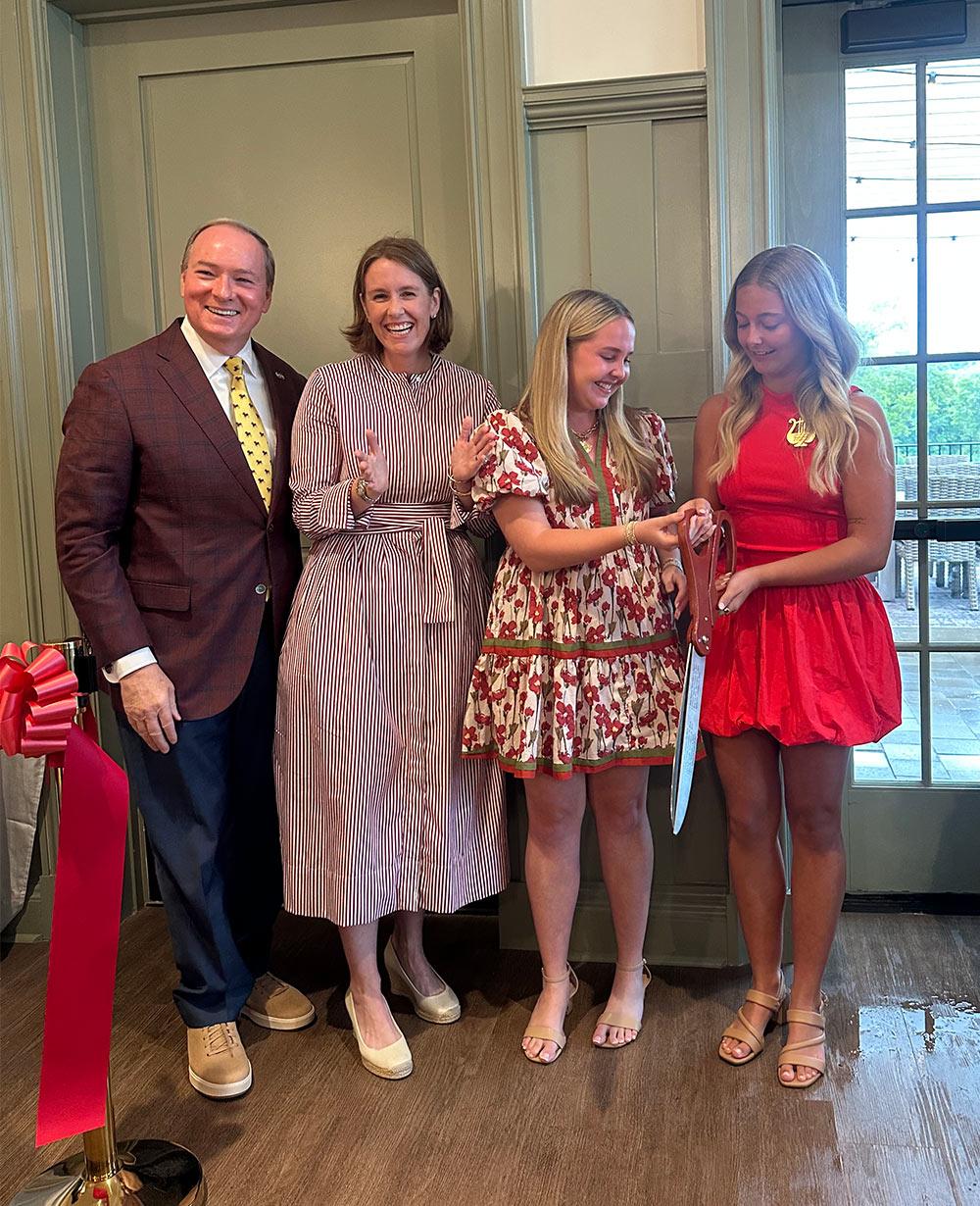 MSU President Mark E. Keenum and Assistant Vice President for Student Affairs Jackie Mullen joined Allie Shoemake, senior political science major from Hixson, Tennessee, and Emma Nevil, sophomore kinesiology major from Crosby, Texas, along with many other outstanding young women of the Epsilon Upsilon chapter of Alpha Chi Omega sorority, for a ribbon-cutting ceremony to celebrate the opening of their new house on campus this Sunday [Oct. 4].